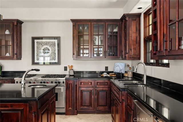 3252 Canyon Oaks, Chico, CA 95928 - kitchen with sink, light tile patterned floors, and high end stove