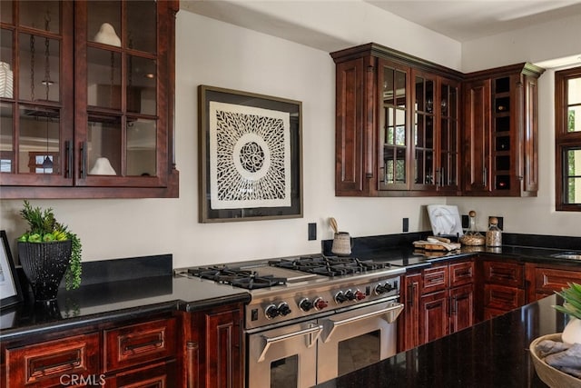 3252 Canyon Oaks, Chico, CA 95928 - kitchen featuring double oven range and dark stone counters