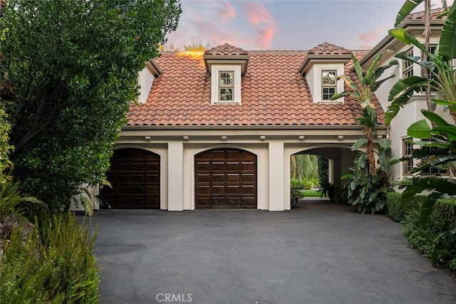3252 Canyon Oaks, Chico, CA 95928 - mediterranean / spanish-style home featuring a garage