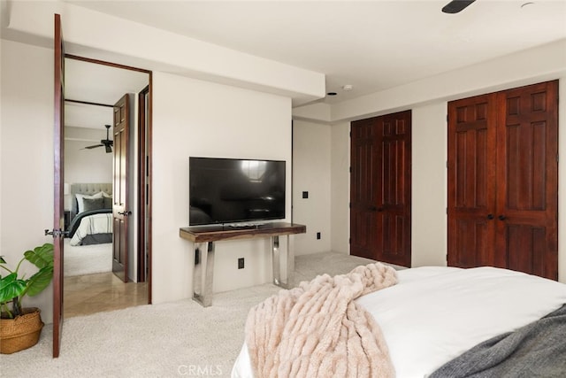 3252 Canyon Oaks, Chico, CA 95928 - bedroom featuring light carpet, multiple closets, and ceiling fan