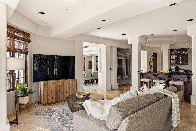 3252 Canyon Oaks, Chico, CA 95928 - living room featuring bar, light tile patterned floors, and a tray ceiling