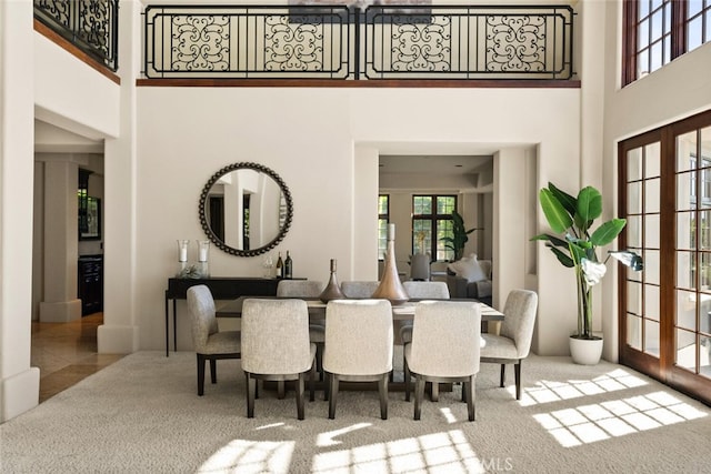 3252 Canyon Oaks, Chico, CA 95928 - carpeted dining area with a towering ceiling and french doors