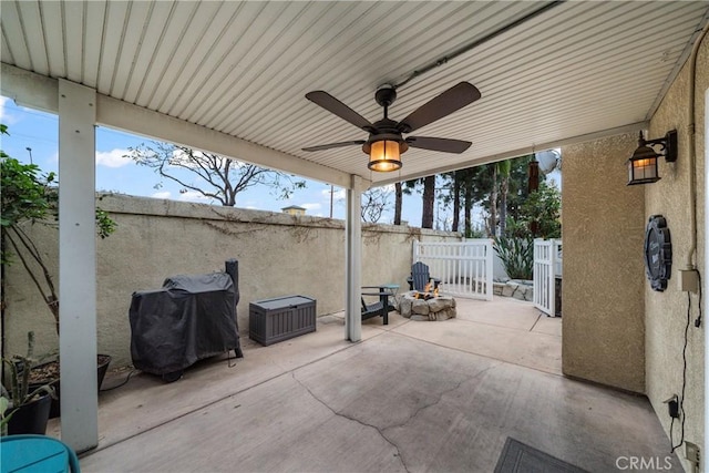 view of patio / terrace featuring ceiling fan and grilling area