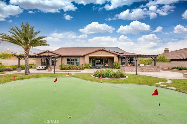 view of property's community with a patio