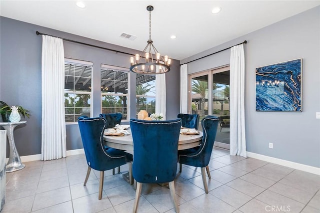 tiled dining area with a notable chandelier