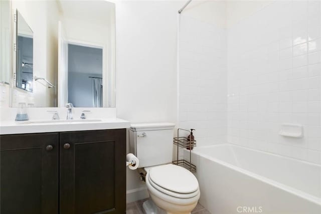 full bathroom with toilet, vanity, and tub / shower combination