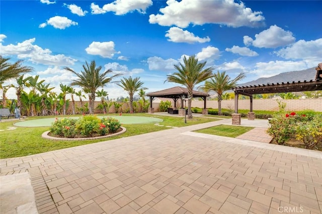 view of community featuring a gazebo and a pergola