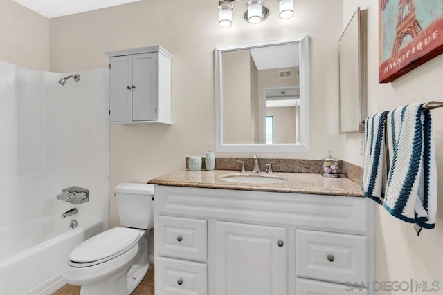 full bathroom with washtub / shower combination, vanity, and toilet