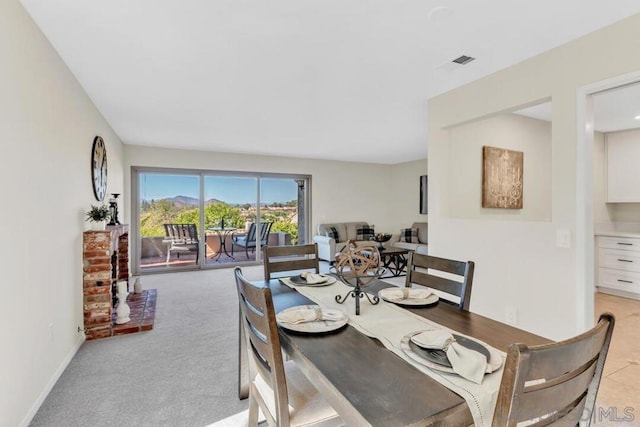 view of carpeted dining room