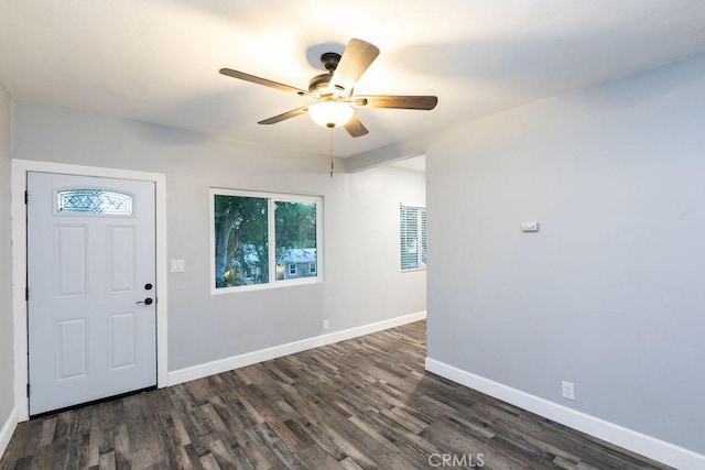 foyer featuring ceiling fan and dark hardwood / wood-style floors