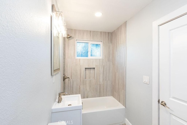 bathroom featuring shower / bathtub combination and toilet