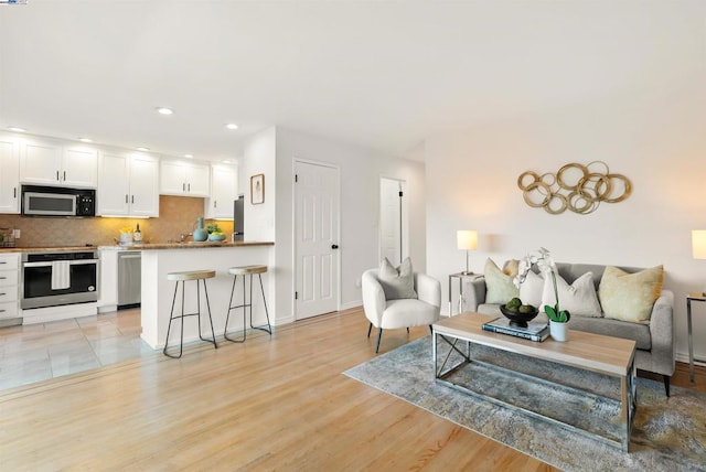 living room with light wood-type flooring