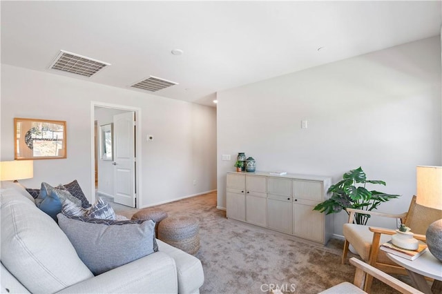 living room with light colored carpet