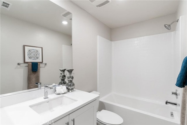 full bathroom with toilet, vanity, and  shower combination