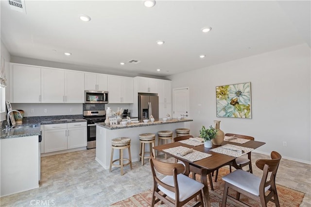 dining room with sink