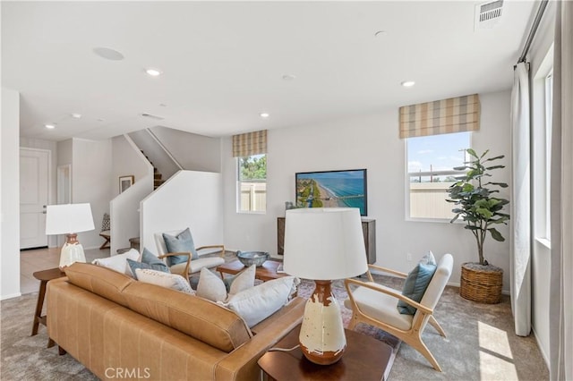 34273 Creek View Ln, Yucaipa, CA 92399 - living area featuring light colored carpet, recessed lighting, and stairs