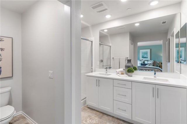 34273 Creek View Ln, Yucaipa, CA 92399 - bathroom with toilet, a shower stall, connected bathroom, double vanity, and recessed lighting