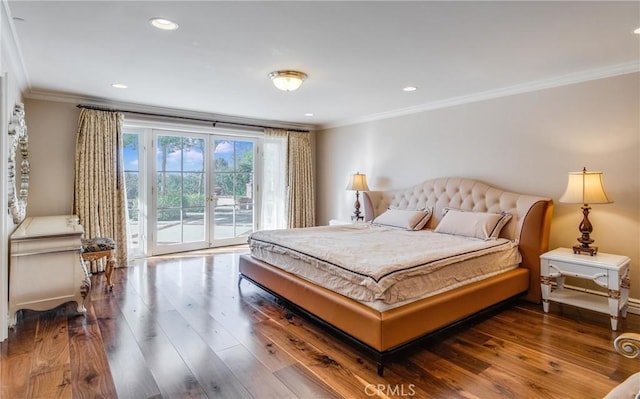 bedroom with access to exterior, crown molding, and hardwood / wood-style floors