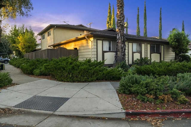 view of property exterior at dusk