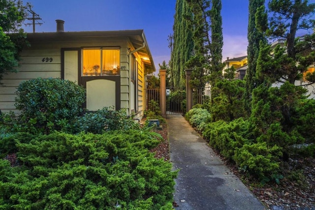 view of property exterior at dusk