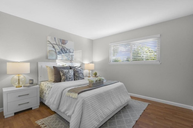 bedroom featuring dark hardwood / wood-style floors