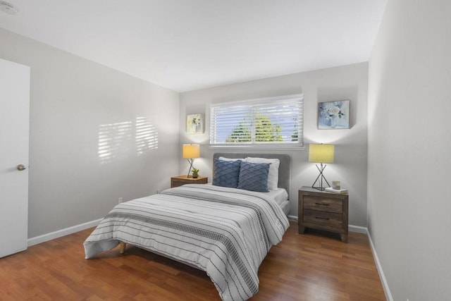 bedroom featuring wood-type flooring