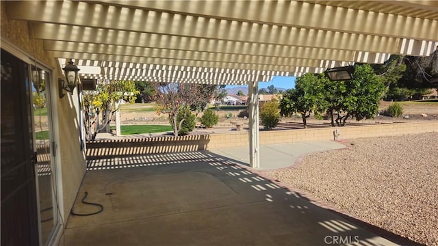 view of patio / terrace featuring a pergola