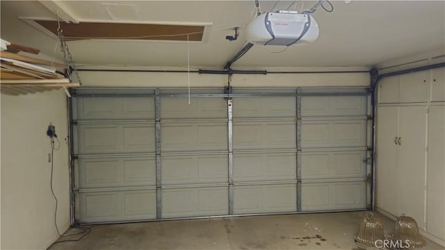 garage featuring a garage door opener