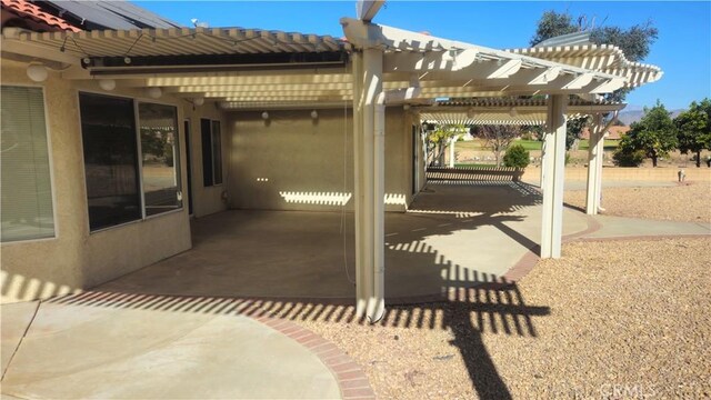 view of patio / terrace featuring a pergola