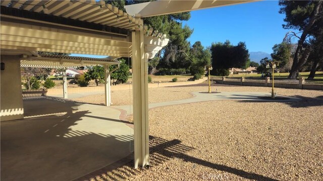 exterior space featuring a pergola