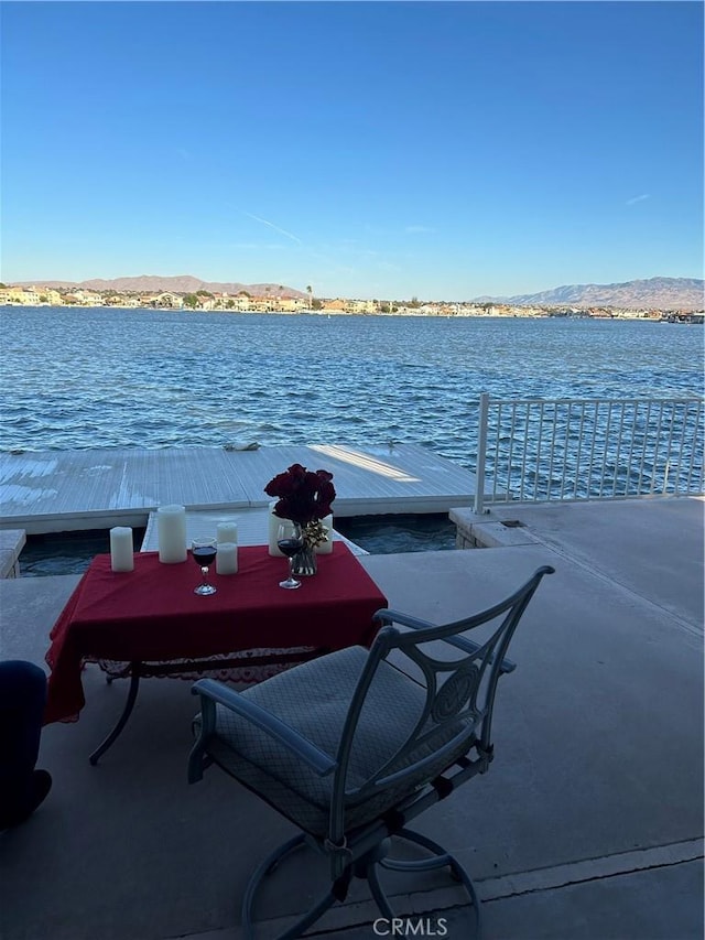 dock area featuring a water view