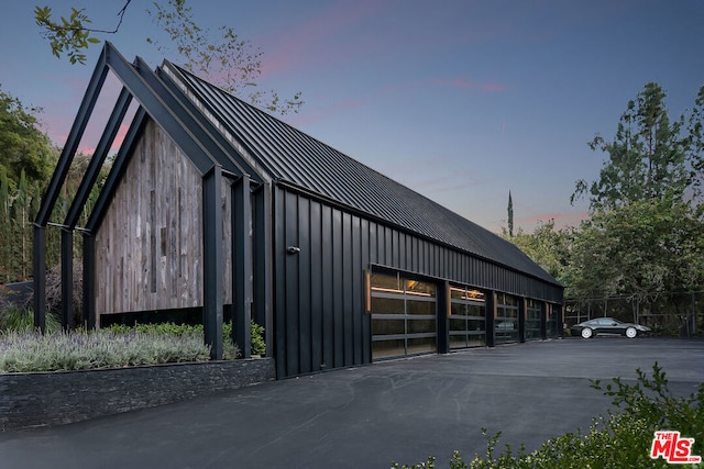 view of property exterior at dusk