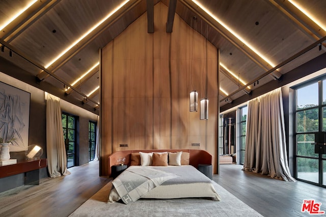 bedroom with wood-type flooring, wood ceiling, access to outside, and wooden walls