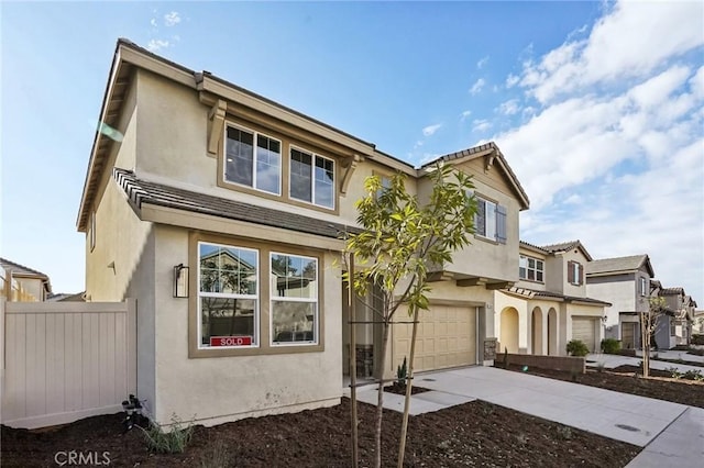 view of front of property featuring a garage