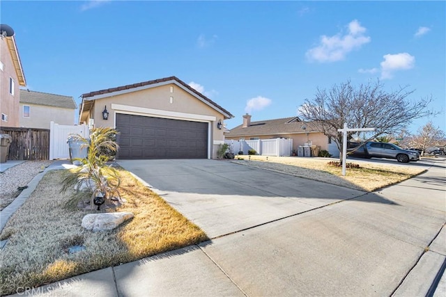 ranch-style house featuring a garage