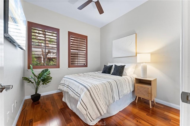 bedroom featuring ceiling fan and hardwood / wood-style floors