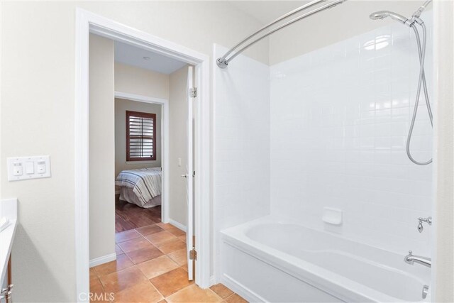 bathroom with shower / bath combination and tile patterned floors