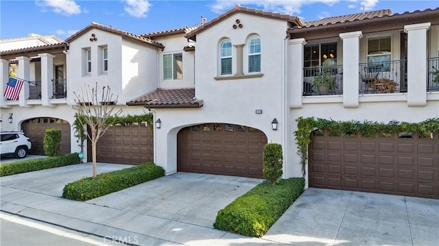 mediterranean / spanish house featuring a garage