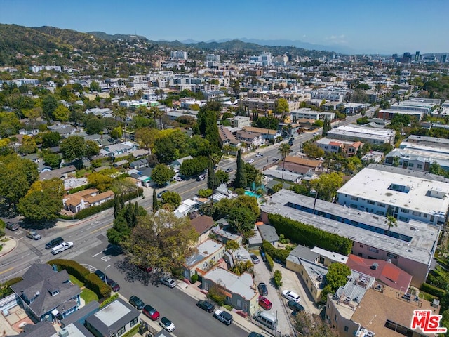 birds eye view of property featuring a mountain view