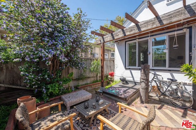 view of patio / terrace featuring a pergola