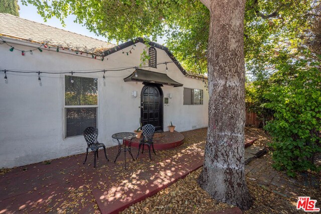 back of house featuring a patio