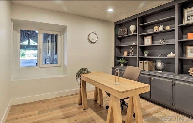 office space with light hardwood / wood-style flooring