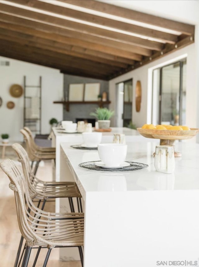 kitchen featuring lofted ceiling and wood ceiling