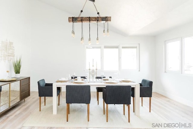 dining space with light wood-type flooring