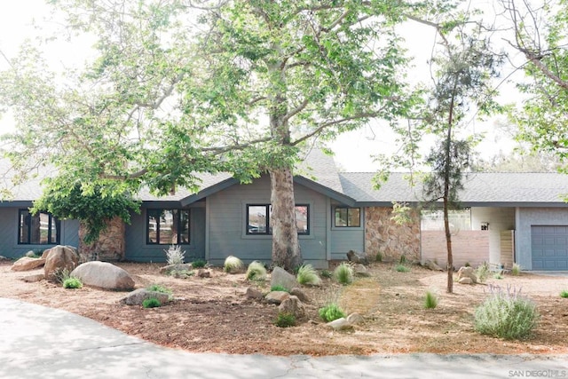 ranch-style home with a garage