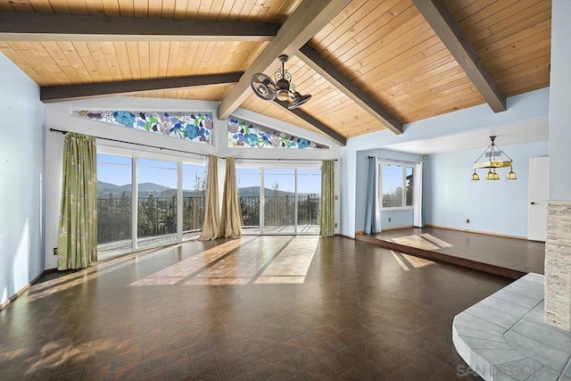 interior space with beamed ceiling, dark parquet flooring, and wooden ceiling