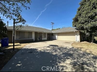 ranch-style home with a garage