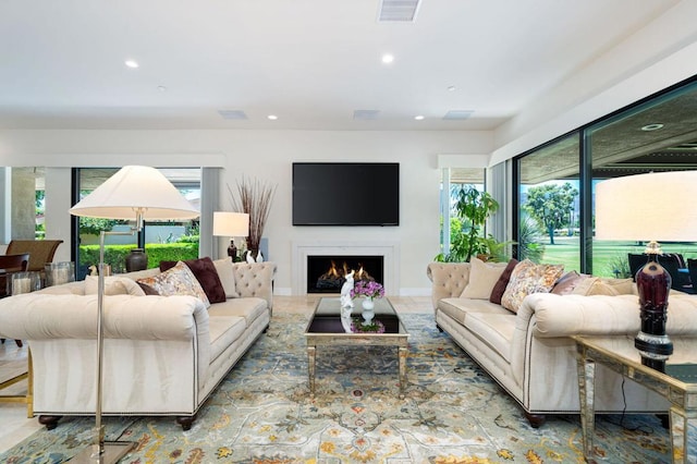 living room featuring plenty of natural light