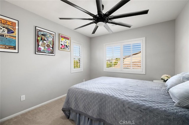 bedroom featuring ceiling fan and carpet floors