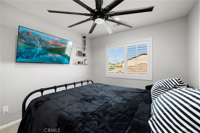 bedroom featuring ceiling fan